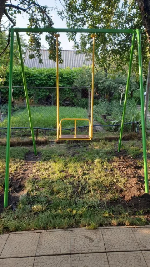 Вуличні гойдалки для дорослих і дітей