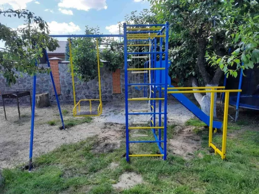 Дитячий спортивно-ігровий комплекс з гойдалкою і гіркою з нержавійки